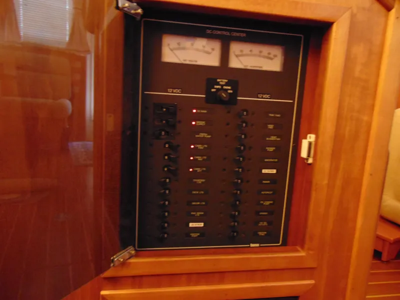 Slide: The Image of Electrical control panel on a 2004 Sabre 36 Flybridge boat. - 16