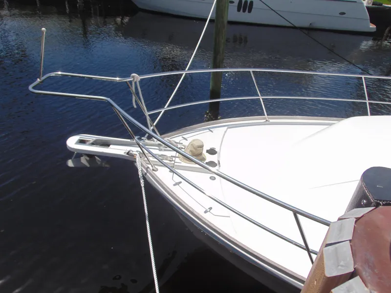 Slide: The Image of 2004 Sabre 36 Flybridge boat docked, bow view. - 6
