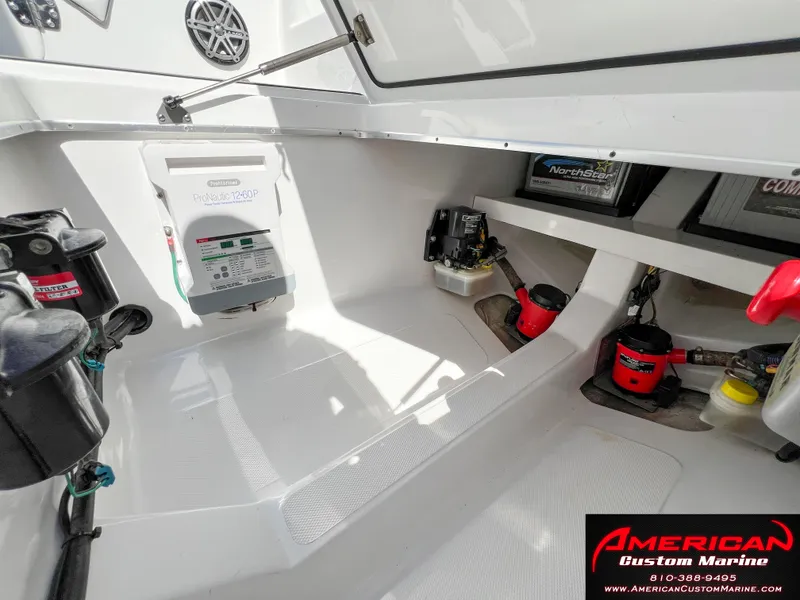 Slide: The Image of Interior of 2018 Cigarette 39 GTS boat with marine equipment and storage compartments. - 17