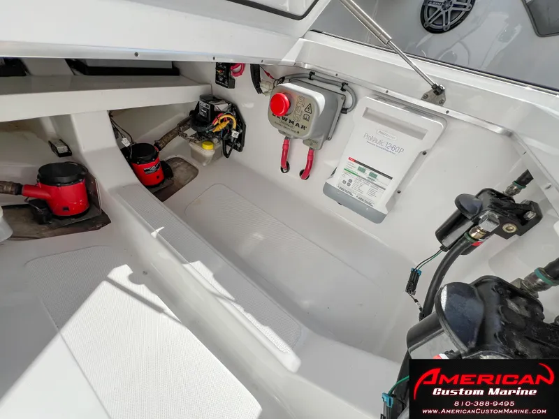 Slide: The Image of 2018 Cigarette 39 GTS boat interior with control panel and wiring. - 18