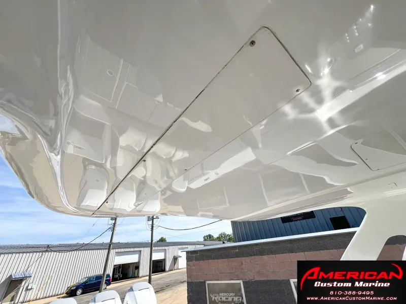 Slide: The Image of 2018 Cigarette 39 GTS boat underside view at American Custom Marine. - 23