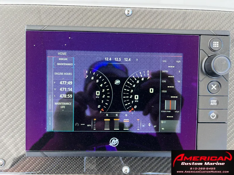 Slide: The Image of Dashboard of a 2018 Cigarette 39 GTS boat with engine hours and gauges. - 9