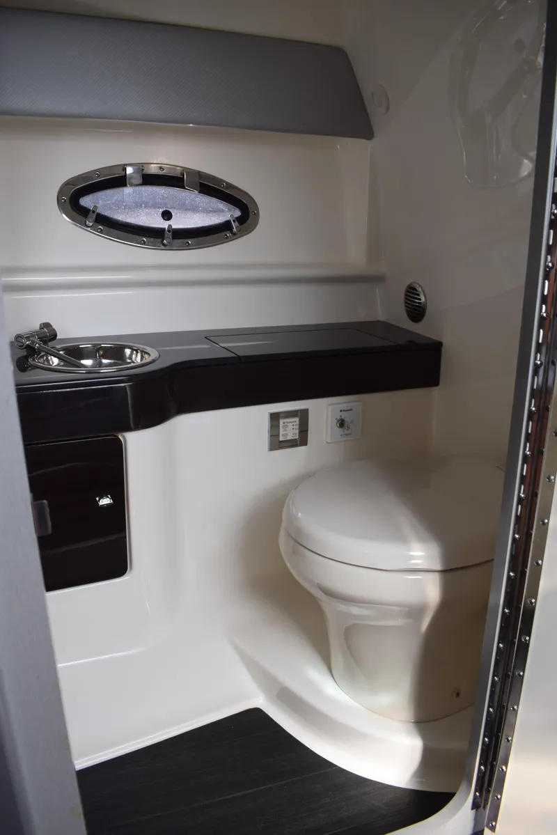 Slide: The Image of 2015 Formula 310 Sun Sport boat bathroom with sink and toilet. - 13