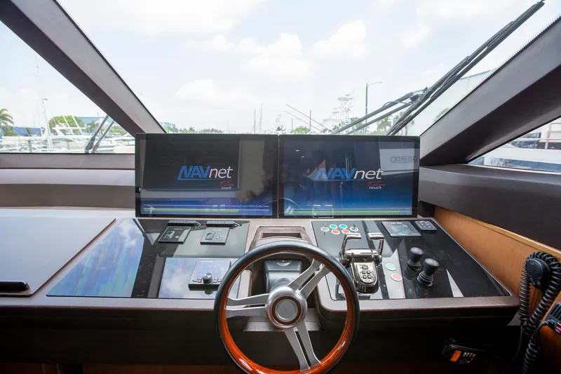 Slide: The Image of Control panel of 2011 Princess 85 Motor Yacht with dual NAVnet screens. - 11