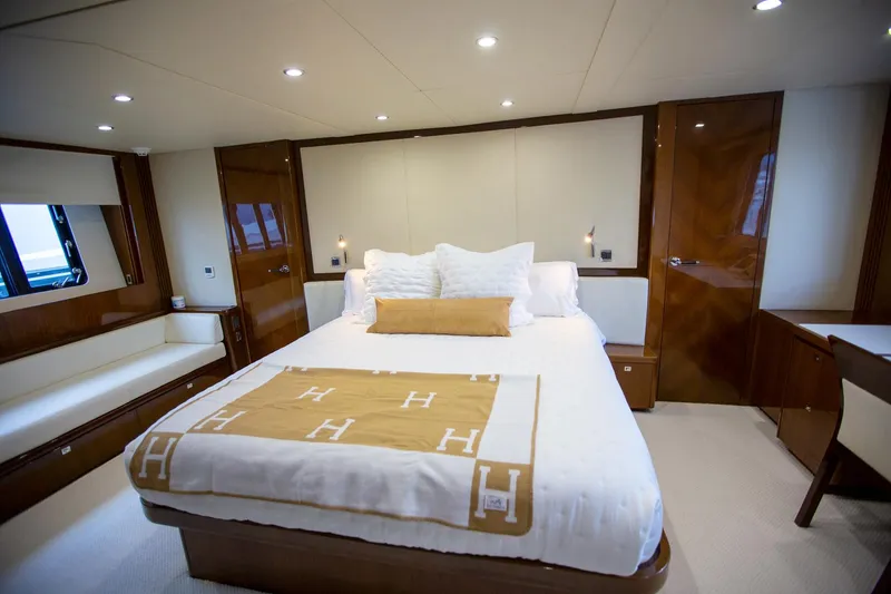 Slide: The Image of Luxurious bedroom interior of 2011 Princess 85 Motor Yacht with elegant wood finishes. - 12