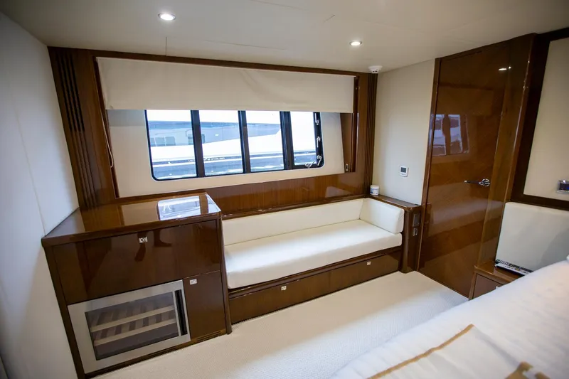 Slide: The Image of Luxurious interior of 2011 Princess 85 Motor Yacht with elegant wood finishes. - 13
