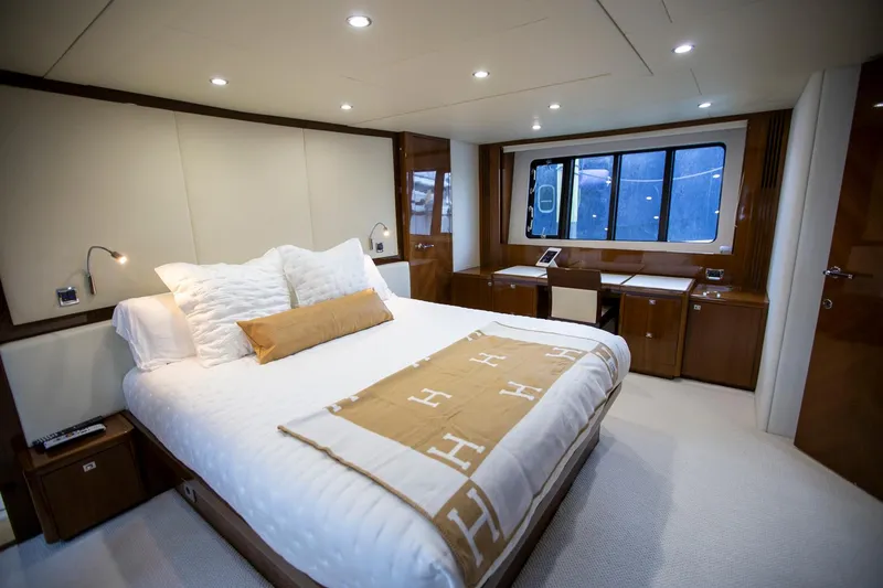 Slide: The Image of Luxurious bedroom interior of 2011 Princess 85 Motor Yacht with elegant decor and large window. - 15