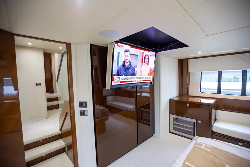 Slide: The Image of Luxurious interior of 2011 Princess 85 Motor Yacht with TV and elegant furnishings. - 20
