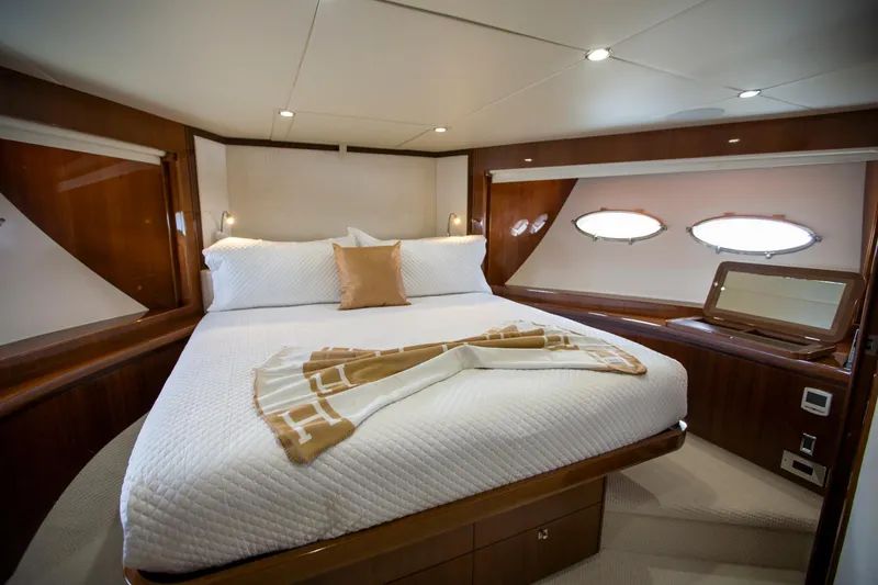 Slide: The Image of Luxurious bedroom interior of 2011 Princess 85 Motor Yacht with elegant wood finishes. - 22