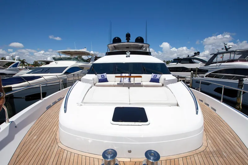 Slide: The Image of 2011 Princess 85 Motor Yacht docked, featuring spacious deck and luxurious seating. - 26