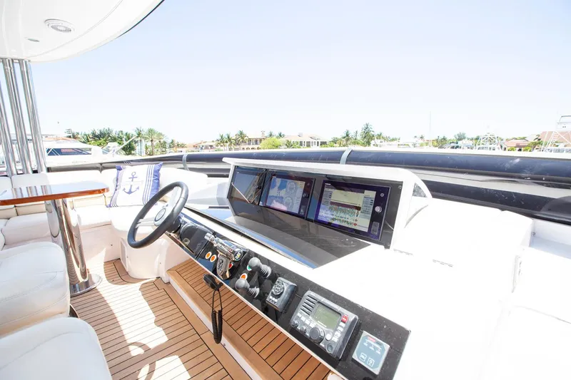 Slide: The Image of Luxurious 2011 Princess 85 Motor Yacht helm with modern navigation equipment. - 29