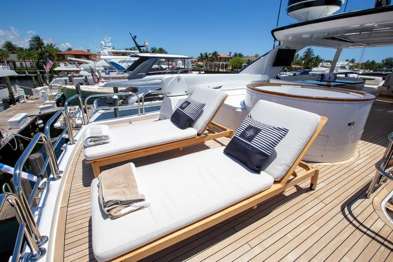 Slide: The Image of Luxurious deck of 2011 Princess 85 Motor Yacht with sun loungers and marina view. - 36
