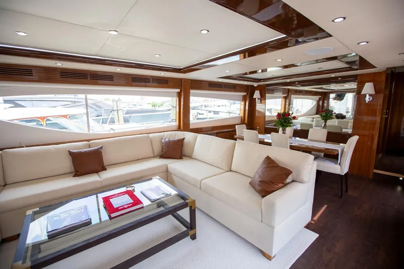 Slide: The Image of Luxurious interior of 2011 Princess 85 Motor Yacht with elegant seating and dining area. - 4