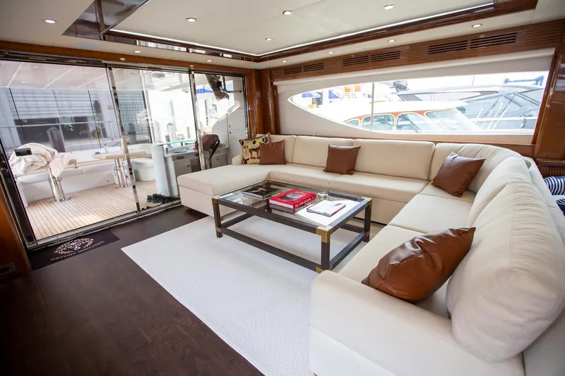 Slide: The Image of Luxurious interior of 2011 Princess 85 Motor Yacht with elegant seating and glass table. - 5