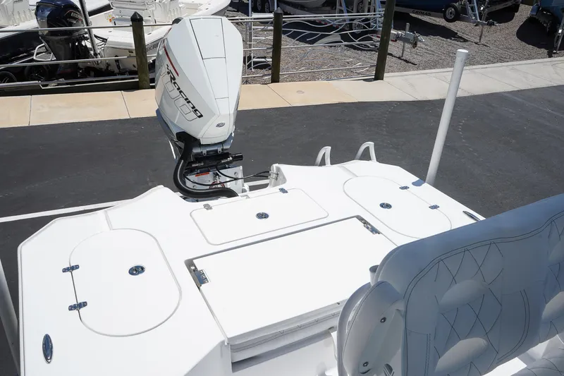 Slide: The Image of 2025 Blazer 2550 GTS boat with outboard motor and seating area. - 10