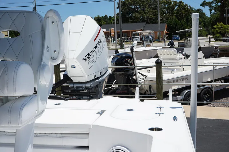 Slide: The Image of 2025 Blazer 2550 GTS boat with powerful outboard motor in marina. - 18