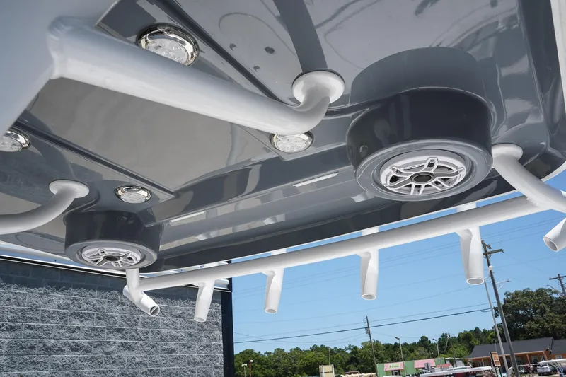 Slide: The Image of 2025 Blazer 2550 GTS boat roof with speakers and rod holders. - 19