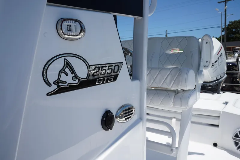 Slide: The Image of 2025 Blazer 2550 GTS boat interior with logo and seating. - 20