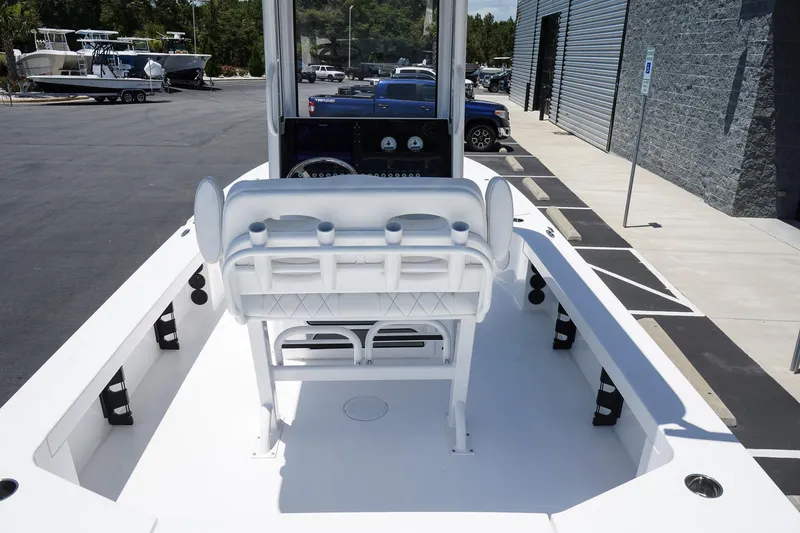 Slide: The Image of 2025 Blazer 2550 GTS boat interior with seating and console. - 9