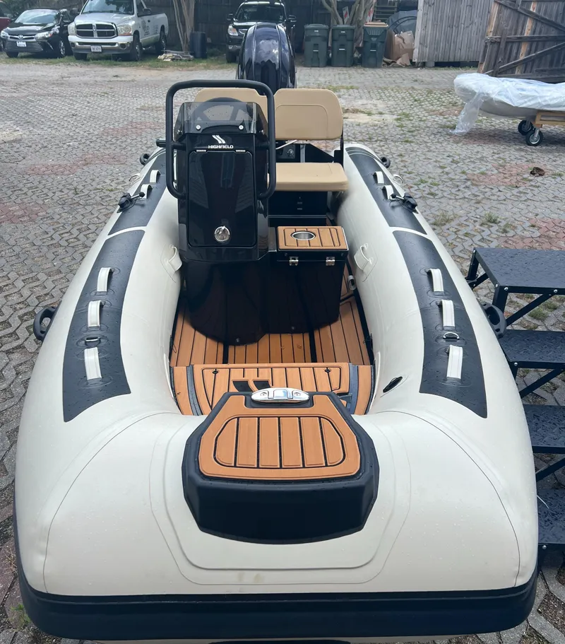 Slide: The Image of 2024 Highfield Classic 380 GT inflatable boat with console and seating. - 1