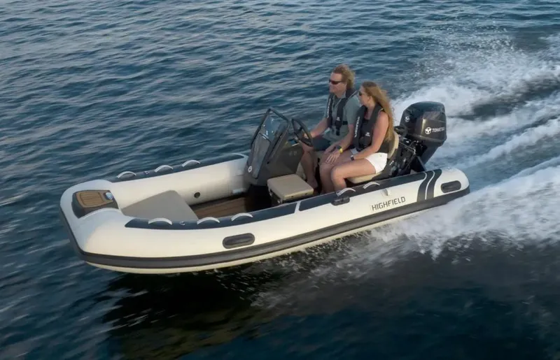 Slide: The Image of 2024 Highfield Classic 380 GT boat cruising on water. - 3