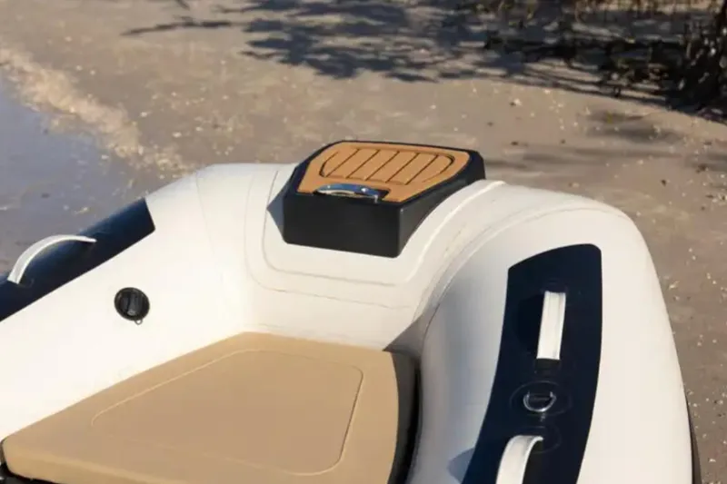 Slide: The Image of 2024 Highfield Classic 380 GT inflatable boat on sandy shore. - 5