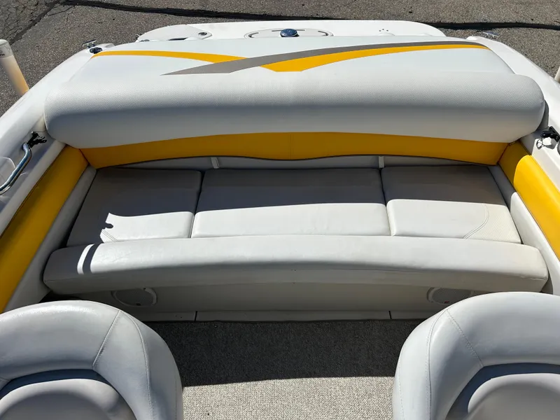 Slide: The Image of 2007 Larson 180SEI LX boat interior with yellow and gray seating. - 13