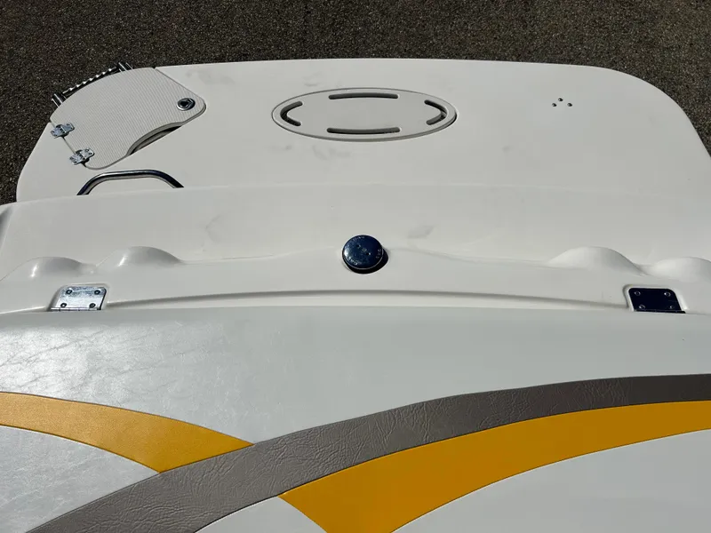 Slide: The Image of 2007 Larson 180SEI LX boat deck with white and yellow design. - 14