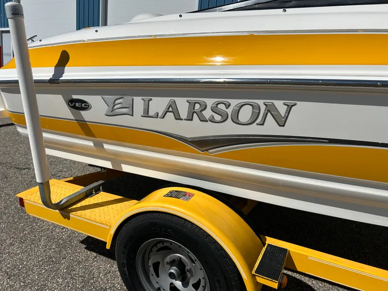 Slide: The Image of Yellow 2007 Larson 180SEI LX boat on trailer, side view. - 3