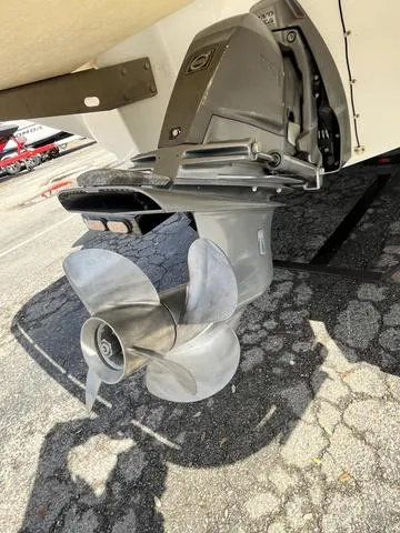 Slide: The Image of Close-up of a 2008 Cobalt 242 boat's propeller and stern drive. - 12