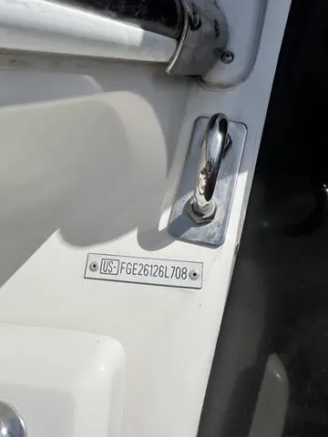 Slide: The Image of 2008 Cobalt 242 boat hull identification number (HIN) plate and cleat. - 13