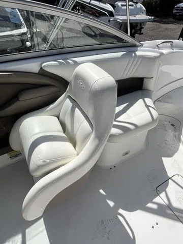 Slide: The Image of 2008 Cobalt 242 boat with white leather seats and clean interior. - 19