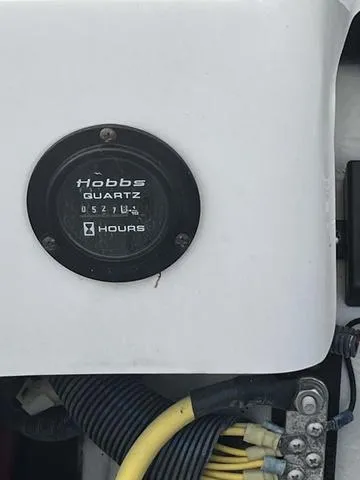 Slide: The Image of Hobbs Quartz hour meter on a 2008 Cobalt 242 boat. - 27