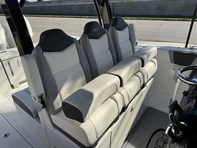 Slide: The Image of 2024 Robalo 360 boat interior seating with premium upholstery. - 25