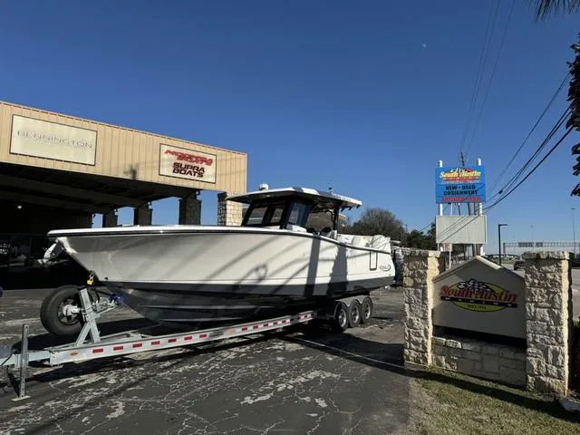 Slide: The Image of 2024 Robalo 360 boat on a trailer at South Austin Marine dealership. - 3