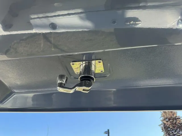 Slide: The Image of Close-up of a 2024 Robalo 360 boat's stainless steel fitting. - 37