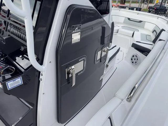Slide: The Image of 2024 Blackfin 272 CC center console boat interior with sleek design and modern features. - 40