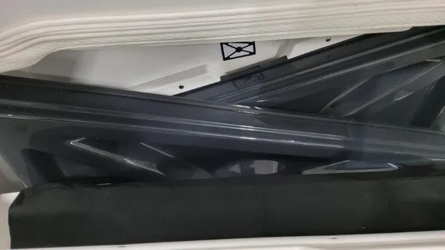 Slide: The Image of Interior detail of 2023 Formula 380 SSC boat showing storage compartment. - 16