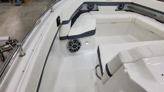 Slide: The Image of 2023 Formula 380 SSC boat interior with white seating and built-in speakers. - 8