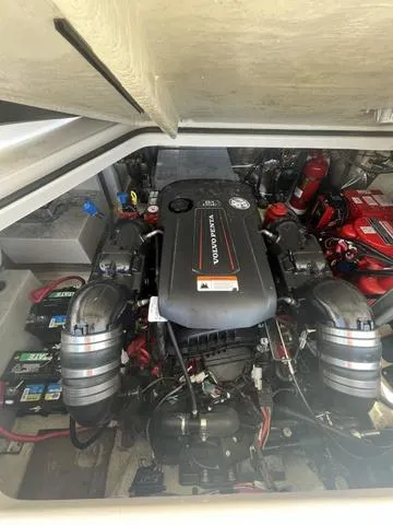 Slide: The Image of 2019 Regal 28 Express engine compartment with Volvo Penta engine. - 15