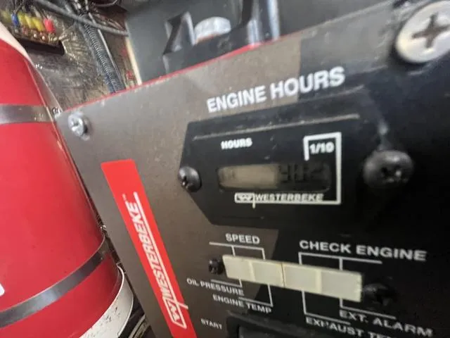Slide: The Image of Close-up of Westerbeke engine hours meter on a 2019 Regal 28 Express boat. - 17
