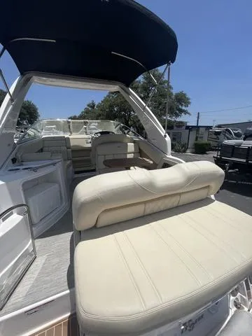 Slide: The Image of 2019 Regal 28 Express boat with spacious seating and canopy. - 4