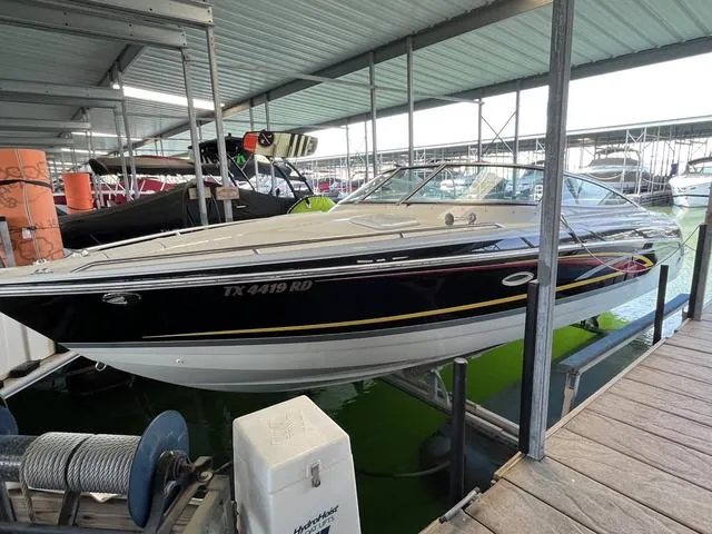 The Image of 2007 Formula Sun Sport 260 boat docked in a covered marina. - 0
