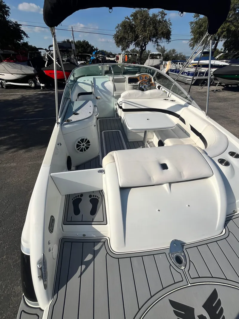 Slide: The Image of 2007 Formula Sun Sport 260 boat interior with seating and deck view. - 19
