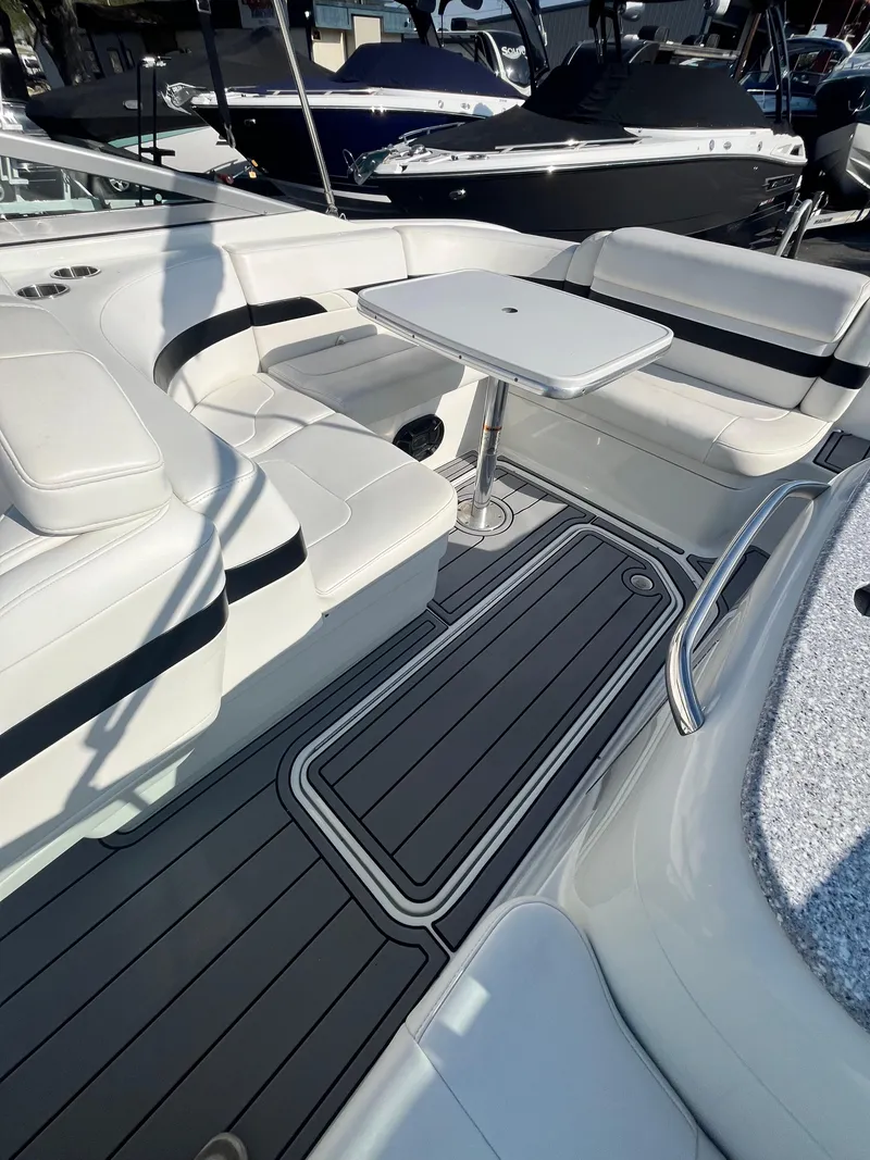 Slide: The Image of 2007 Formula Sun Sport 260 boat interior with seating and table. - 22