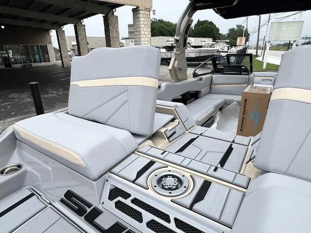 Slide: The Image of 2024 Supra SL 450 boat interior with luxurious seating and modern design. - 17