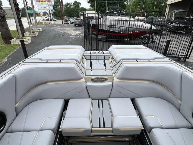 Slide: The Image of 2024 Supra SL 450 boat interior with luxurious seating and modern design. - 26