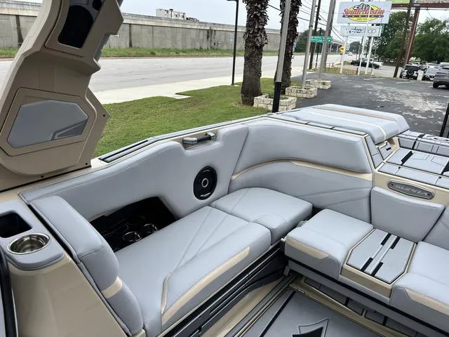 Slide: The Image of 2024 Supra SL 450 boat interior with luxurious seating and modern design. - 27