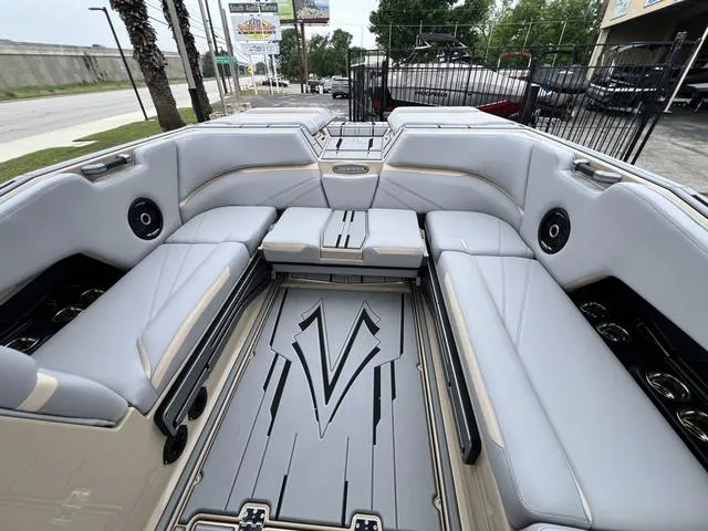 Slide: The Image of 2024 Supra SL 450 boat interior with luxurious seating and modern design. - 29