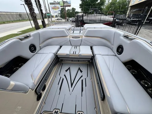 Slide: The Image of 2024 Supra SL 450 boat interior with luxurious seating and modern design. - 30